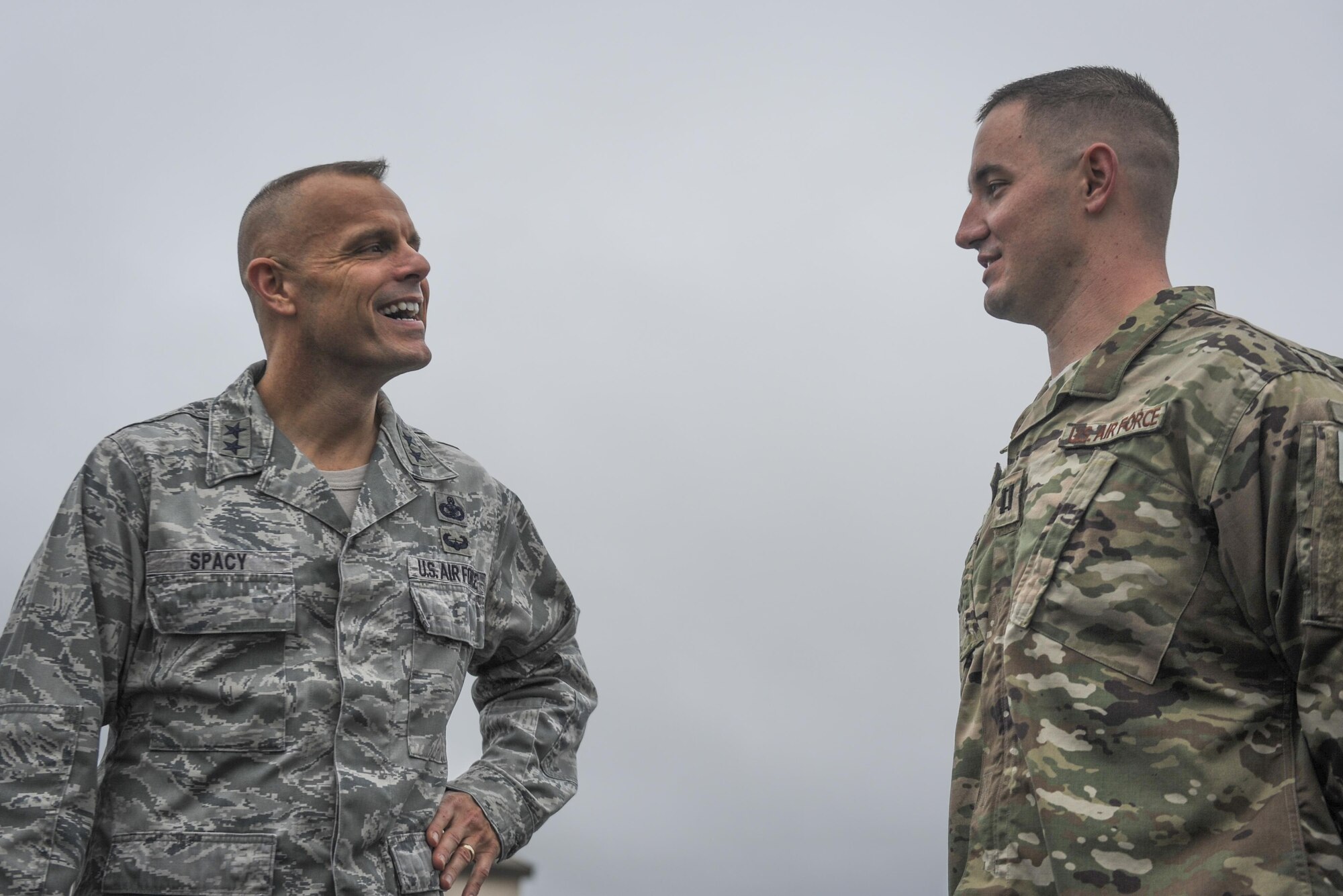 Maj. Gen. Bradley Spacy, left, the commander of the Air Force Installation and Mission Support Center, speaks with Capt. Justin May, operations officer with the 1st Special Operations Security Forces Squadron, at Hurlburt Field, Fla., Dec. 14, 2016. Spacy observed capability demonstrations such as the 1st Special Operations Logistics Readiness Squadron conducting a Forward Air Refueling Point. Special teams of fuels Airmen provide a critical capability for wartime and humanitarian missions as FARP operations expand the role of special operation forces around the world. They provide a means of "hot" refueling from a tanker aircraft to various types of fixed and rotor-wing receiver aircraft. (U.S. Air Force photo by Airman Dennis Spain)