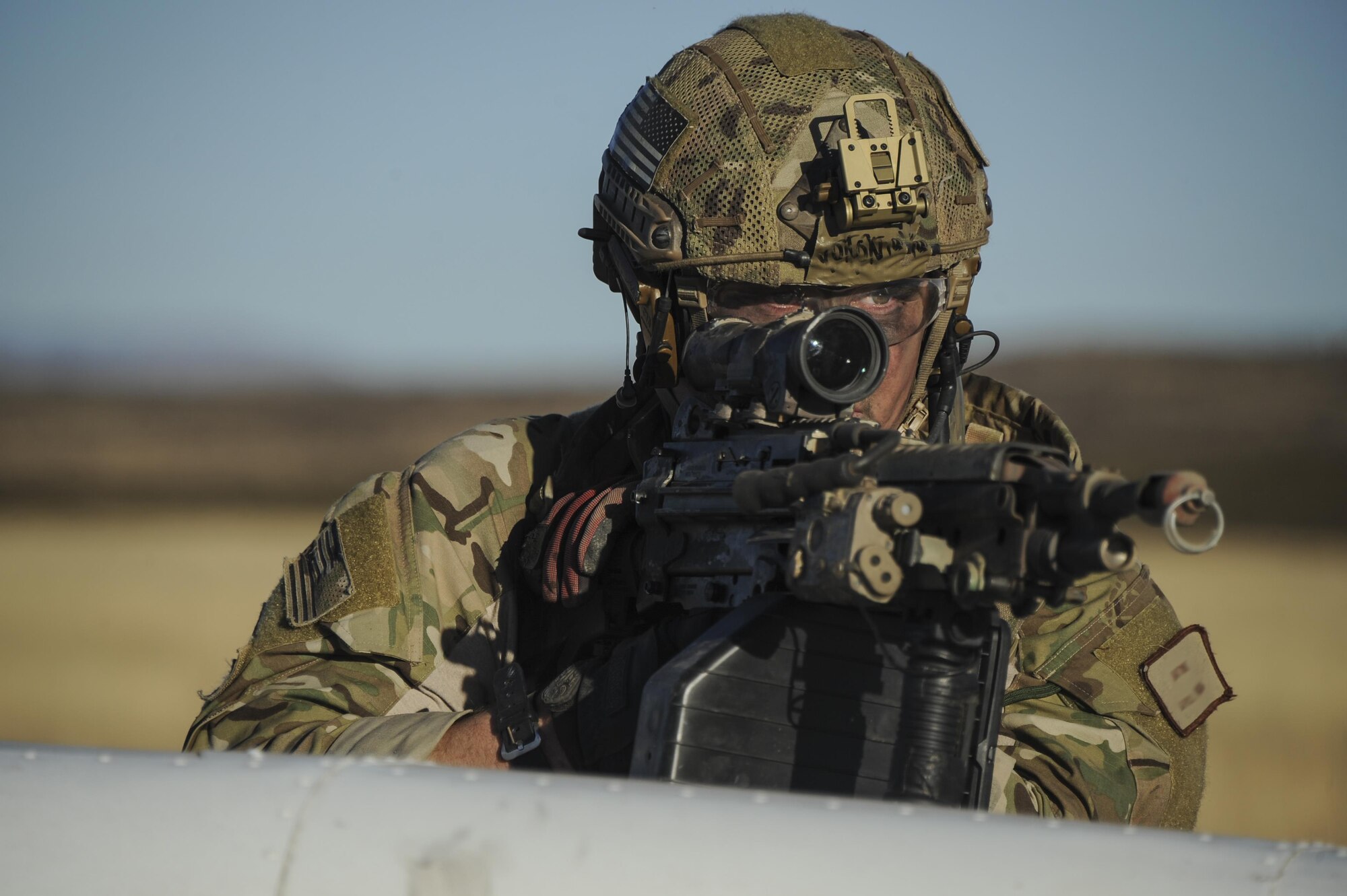 An Air Force pararescueman, assigned to the 48th Rescue Squadron, provides overwatch during a mass casualty exercise at Fort Huachuca, Ariz., Dec. 8, 2016. During the exercise, pararescuemen were expected to triage, treat and evacuate casualties, and eliminate any presence of simulated opposing forces. (U.S. Air Force photo/Airman 1st Class Mya M. Crosby)