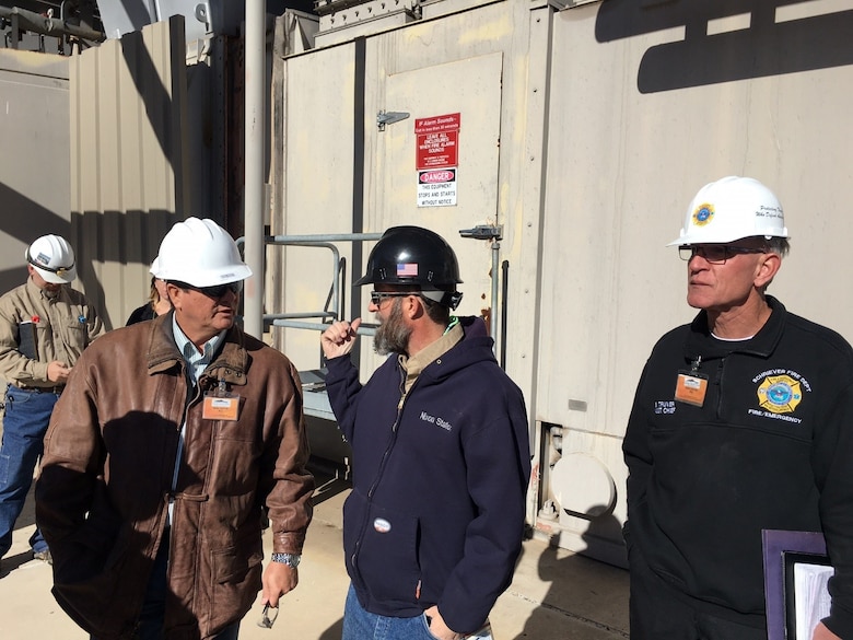 Joel Bernal, 50th Civil Engineer Squadron Power Production supervisor, speaks to Rob Rawson, Operations Superintendent, at the Ray Nixon Power Plant in Fountain, Colorado, Nov. 23, 2016. 50 CES leaders visited the power plant to learn more about Colorado Springs Utilities Gas Turbine Generation operations. (Courtesy photo)