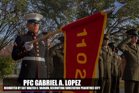 Private First Class Gabriel A. Lopez, honor graudate of platoon 1102, presents his guidon before graduation Dec. 16, 2016, aboard Marine Corps Recruit Depot, Parris Island, South Carolina. Lopez, native of Tamarac, Fla., was recruited by Sgt. Robert A. Leachman from Recruiting Substation Fort Lauderdale. (Official Marine Corps photo by Cpl. John-Paul Imbody/Released)