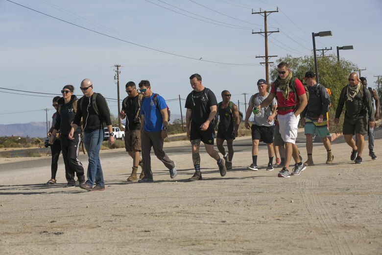 Participants of the second annual Road March for St. Jude Children’s Research Hospital hike to raise money for charity in Twentynine Palms, Calif., Dec. 10, 2016. Mark Gelekto, tactical training support, 7th Marine Regiment, organized the event to raise money to donate to children in need. (Official Marine Corps photo by Cpl. Thomas Mudd/Released)