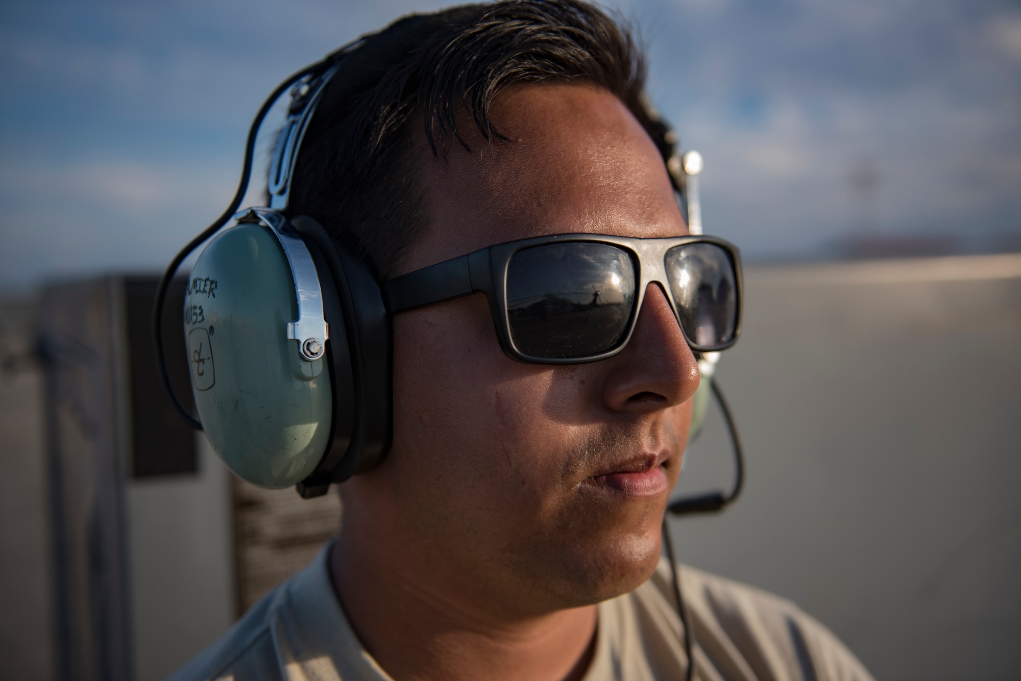 Senior Airman Aaron Mier, 41st Helicopter Maintenance Unit crew chief, watches as an HH-60G Pave Hawk prepares to launch, Dec. 12, 2016, at Patrick Air Force Base, Fla. Airmen conducted two weeks of spin-up training with a higher operations tempo to provide a more realistic deployed environment. (U.S. Air Force photo by Airman 1st Class Daniel Snider)