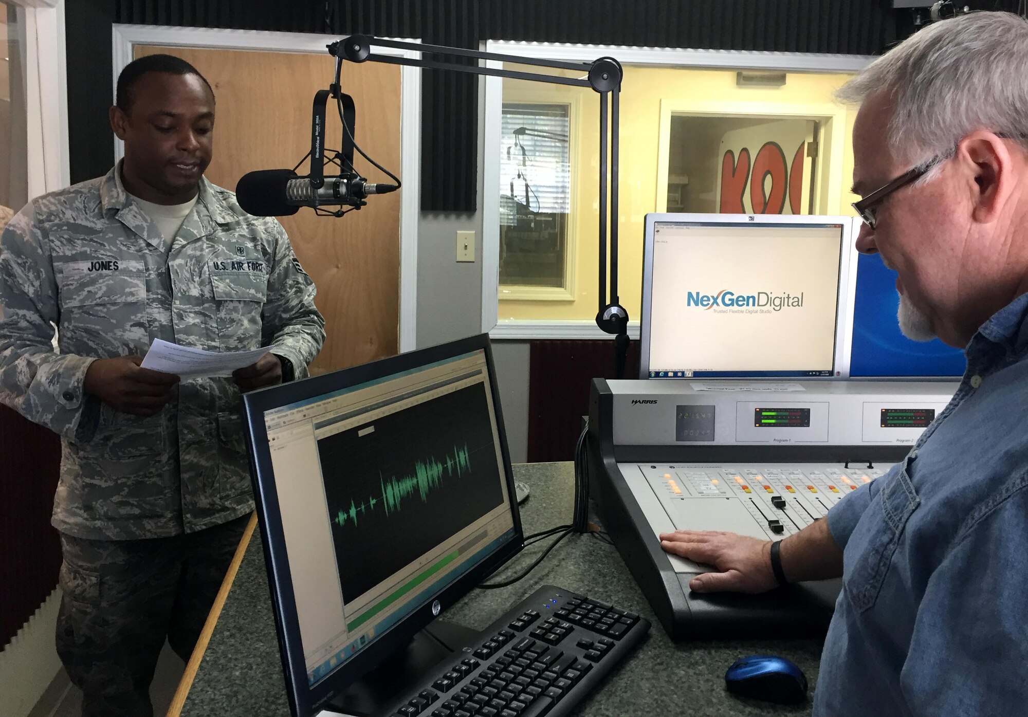 Senior Airman Laborian Jones, 403rd Aeromedical Staging Squadron, records a holiday greetings message at I Heart Media in Biloxi, Mississippi. Jones along with 15 other 403rd Wing members recorded messages that will air on eight radio stations along the Gulf Coast through Jan. 1, 2017. The stations are 92.5 FM, 93.7 FM, 99.1 FM, and 104.9 FM in Biloxi, and 103.7 FM, 100 FM, 102 FM, and 106.3 FM in Hattiesburg, Mississippi. (U.S. Air Force photo/Maj. Marnee A.C. Losurdo)