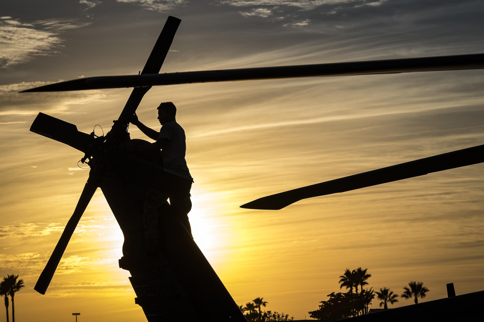 Senior Airman Aaron Mier, 41st Helicopter Maintenance Unit crew chief checks the tail rotor of an HH-60G Pave Hawk during a post-flight inspection, Dec. 12, 2016, at Patrick Air Force Base, Fla. The 41st HMU worked alongside the 41st Rescue Squadron for ten days as they conducted pre-deployment “spin-up” training. The maintainers were responsible for ensuring three aircraft were combat-ready at a moment’s notice and worked around the clock to meet this requirement for both day and night missions. (U.S. Air Force photo by Staff Sgt. Ryan Callaghan)