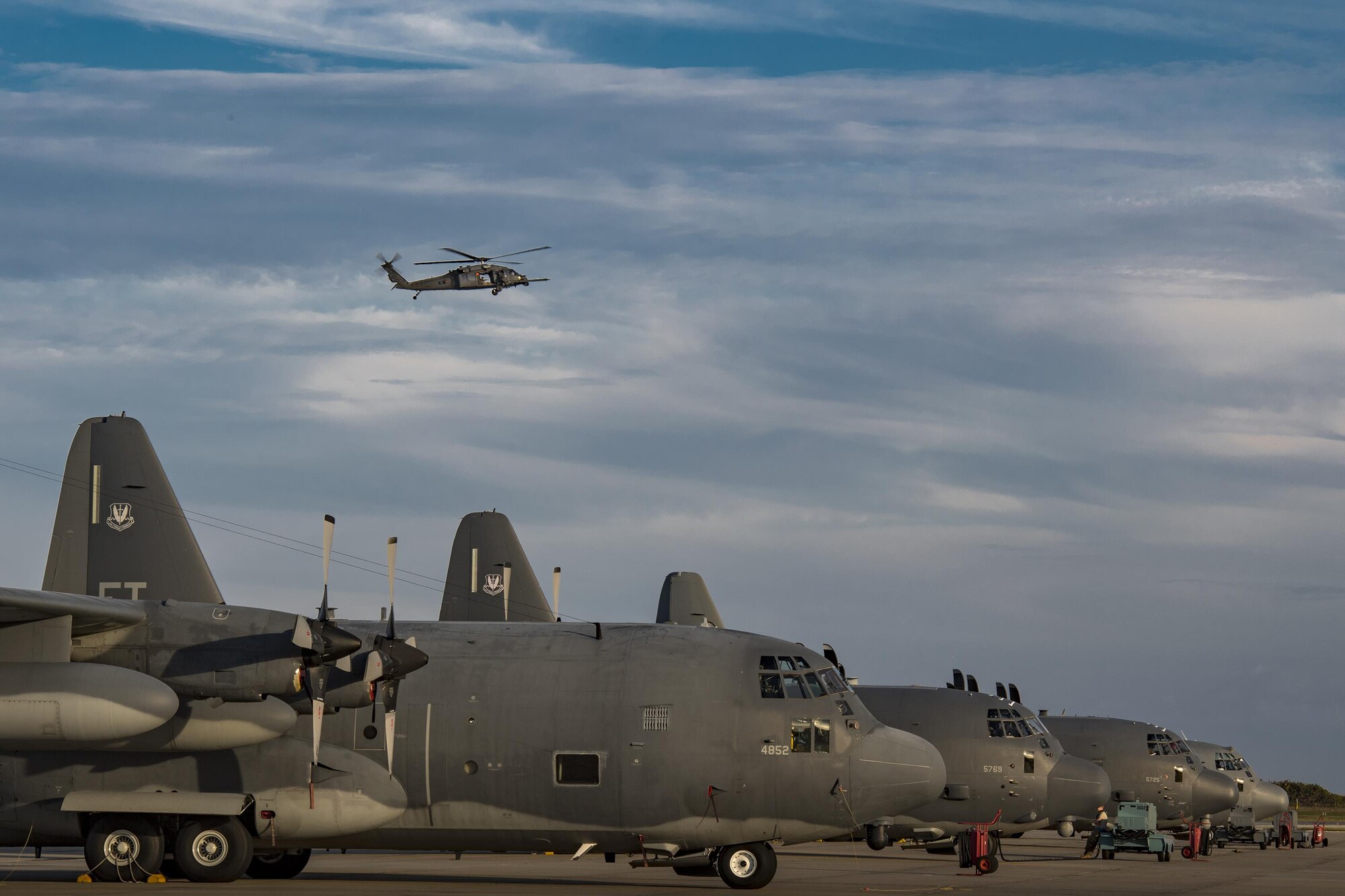 An HH-60G Pave Hawk from the 41st Rescue Squadron flies over the flightline during a ‘spin-up’ exercise, Dec. 12, 2016, at Patrick Air Force Base, Fla. During the spin-up, the 41st RQS, alongside mission partners from the 38th and 71st Rescue Squadrons, conducted high-tempo rescue operations designed to mimic the missions they will fly downrange. They based their operations out of Patrick AFB and flew missions to Avon Park Air Force Range, Fla.(U.S. Air Force photo by Staff Sgt. Ryan Callaghan)