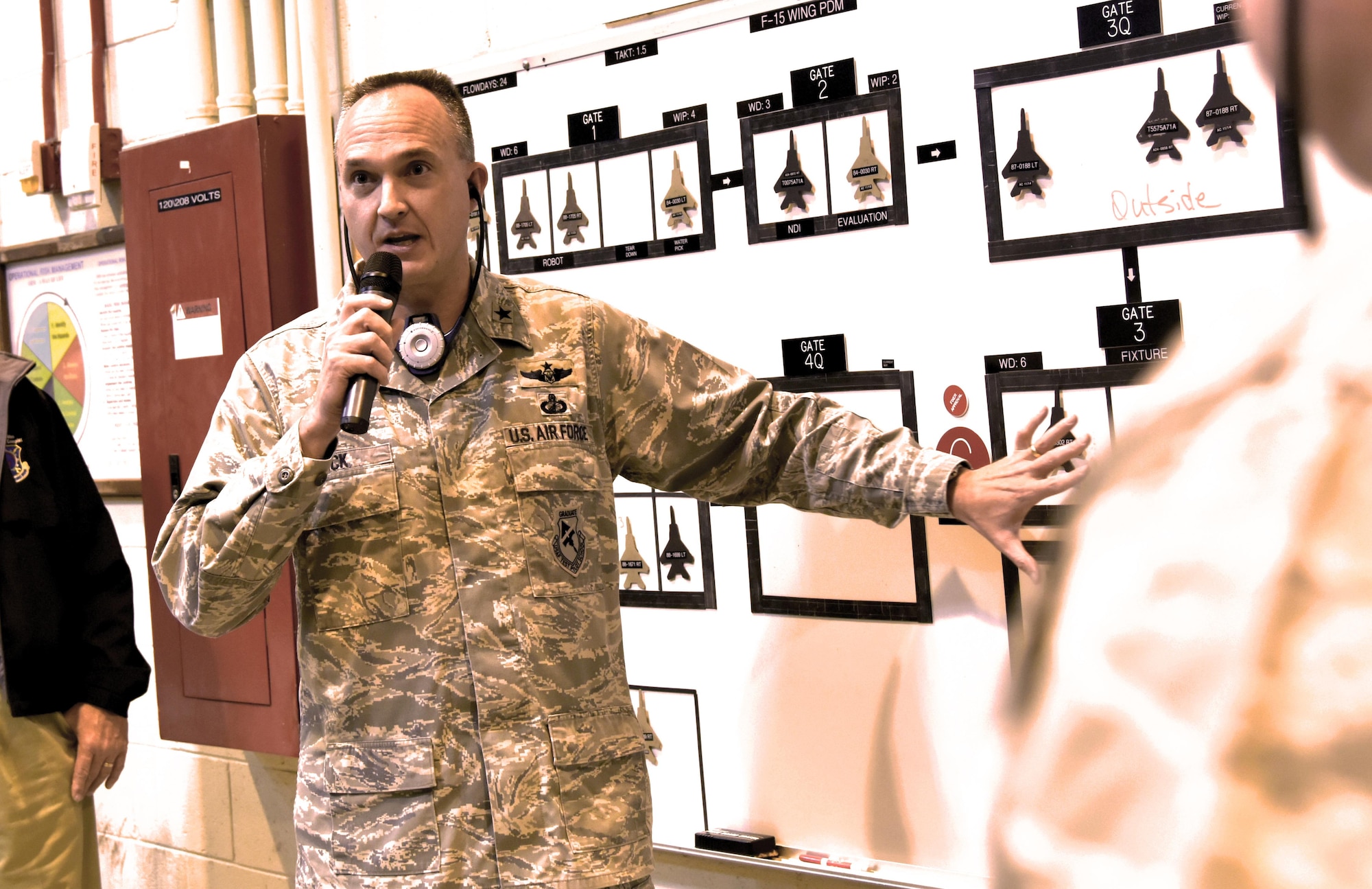 Brig. Gen. Eric Fick, Office of the Assistant Secretary of the Air Force for Acquisition Global Reach Programs director, speaks with members of the Warner Robins Air Logistics Complex during a recent visit to Robins Air Force Base, Ga. (U.S. Air Force photo by Ray Crayton)