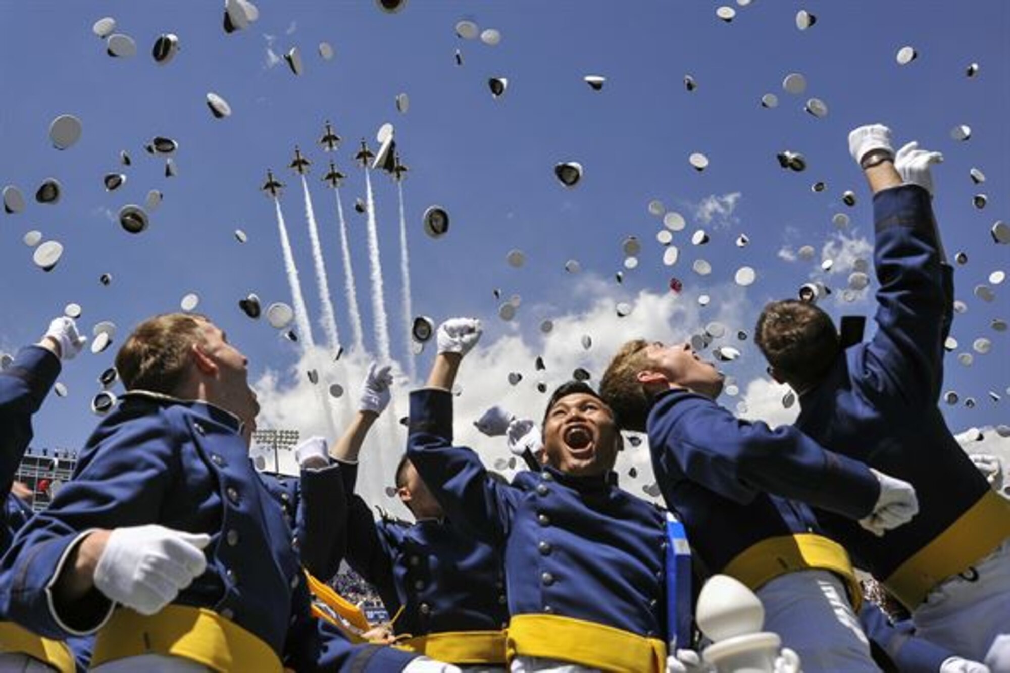 Four cadets received their diplomas and took their oath of office Dec. 14, 2016, at the Air Force Academy's winter graduation ceremony. (U.S. Air Force photo)
