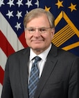 Ambassador Richard Norland, Foreign Policy Advisor to the Chairman of the Joint Chiefs of Staff, poses for his official portrait in the Army portrait studio at the Pentagon in Arlington, Virginia, Dec 14, 2016.  (U.S. Army photo by Monica King/Released)