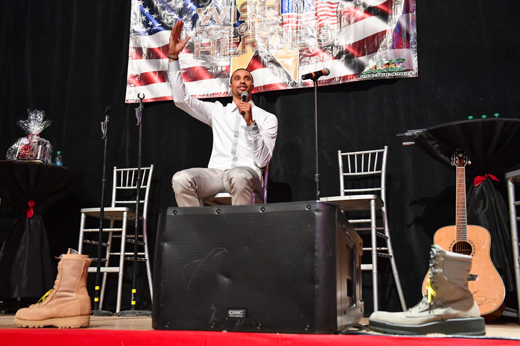 Utah Jazz point guard George Hill speaks during the G3 Holiday Bash 2016, Park City Film Studios, Park City, Utah, Dec. 15, 2016. The focus of the event was to assist Utah military families during the holiday season. The event also featured live and silent auctions to raise money for the local military community, and a concert by country singer Dustin Lynch. (U.S. Air Force photo/R. Nial Bradshaw)