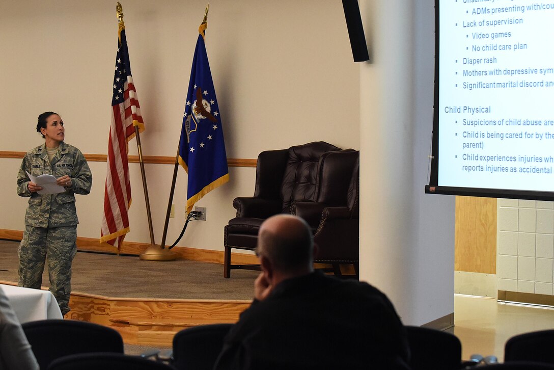 Capt. Christina Stabile, 4th Medical Operations Squadron family advocacy officer, discusses warning signs which could indicate abuse at home, Dec. 13, 2016, at Seymour Johnson Air Force Base, North Carolina. Detecting early signs of abuse can help prevent the situation from escalating and getting Airmen the help they may need.