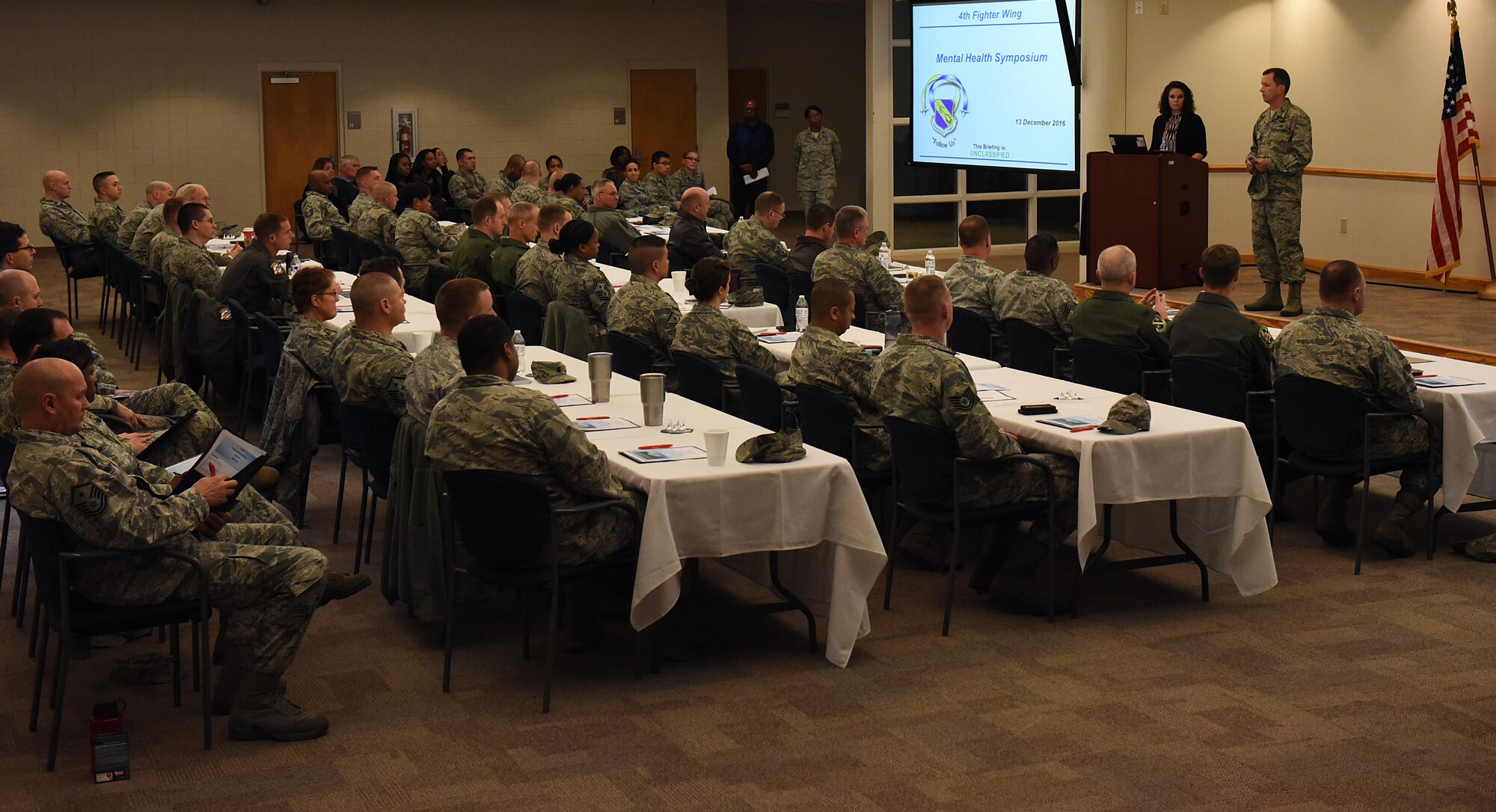 Col. Christopher Sage, 4th Fighter Wing commander, discusses the importance of detecting troublesome early warning signs in Airmen at a mental health symposium, Dec. 13, 2016, at Seymour Johnson Air Force Base, North Carolina. Early detection of mental health problems allows leadership to be proactive to potential situations before they arise.