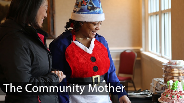 Growing up, Lavonne Robinson (right), a civilian Marine Corps logistician, looked up to her mother who always helped others in the community. Today, Robinson volunteers regularly at work, church and in her local community, building morale and helping others in need. (U.S. Marine Corps photo by Monique Randolph)