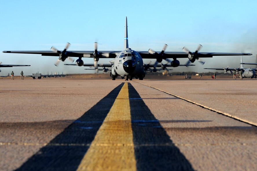 A C-130 Hercules, assigned to the Delaware Air National Guard, prepares for takeoff during JFEX 16B at Dyess Air Force Base, Texas, Dec. 10, 2016. The exercise is a U.S. Air Force Weapons School large-scale air mobility exercise in which participants plan and execute a complex air-land operation in a simulated contested battlefield. (U.S. Air Force photo by Airman 1st Class Emily Copeland)
