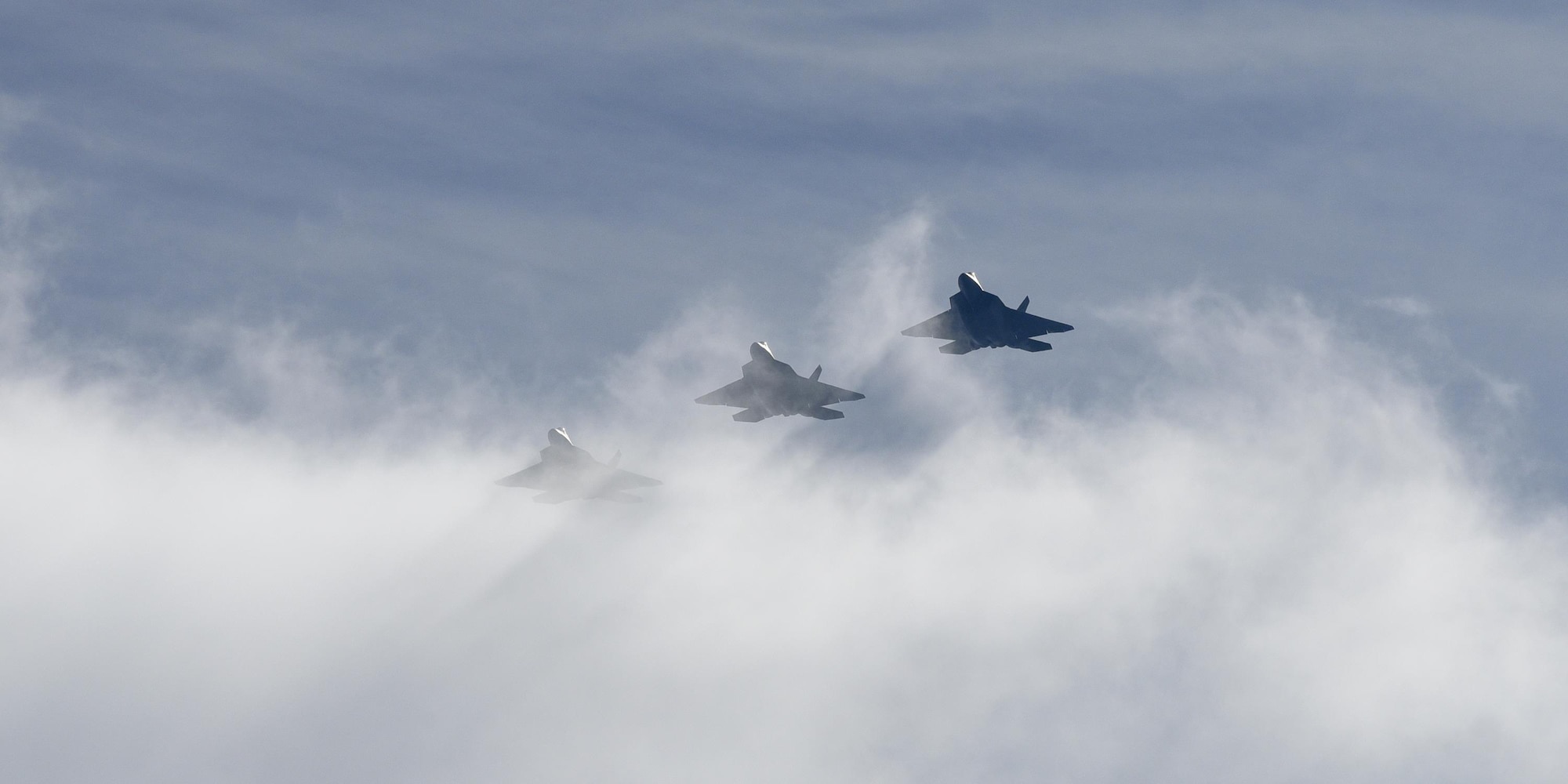 Three U.S. Air Force F-22 Raptors from Tyndall Air Force Base, Fla., fly in formation during Checkered Flag 17-1, Dec. 8, 2016. The integration training pilots receive during exercises like Checkered Flag ensure they can seamlessly work together in a real-world combat situation. (U.S. Air Force photo by Staff Sgt. Alex Fox Echols III/Released)