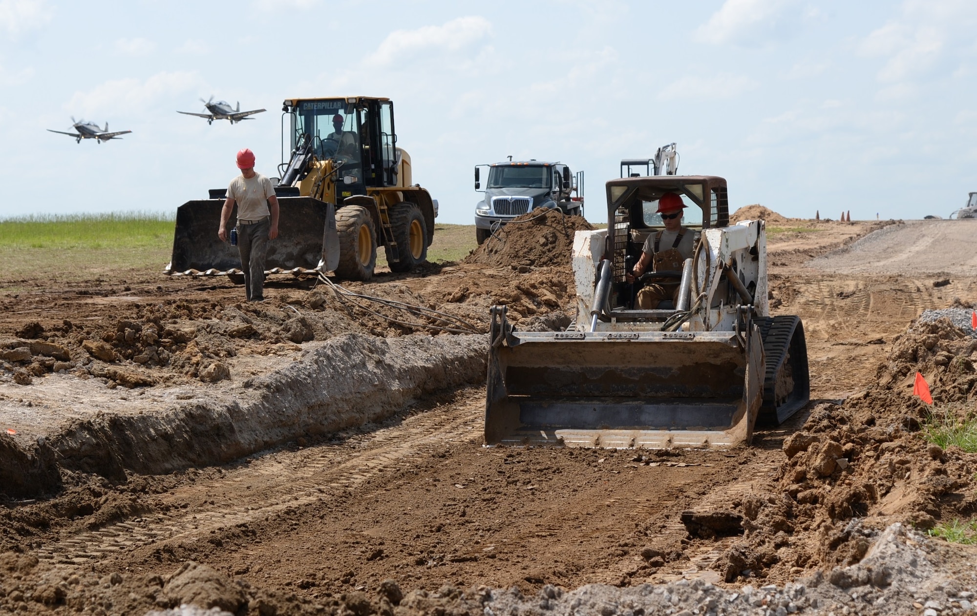 Airmen from the 823rd Rapid Engineer Deployable Heavy Operational Repair Squadron, Engineering, Hurlburt Field, Florida, work on the flightline of Columbus Air Force Base, Mississippi, July 12, 2016. Airmen from the 823rd REDHORSE work on these sorts of projects to meet training requirements and prepare for deployments, which also benefit stateside Air Force bases. (U.S. Air Force photo by Airman 1st Class John Day) 