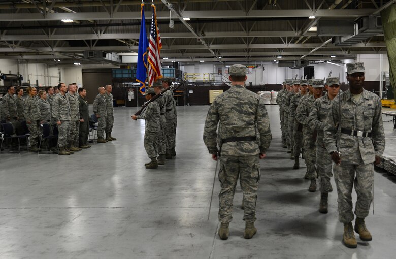 Airmen from the McChord Field Honor Guard perform facing movements during a change or responsibility ceremony Dec. 13, 2016, at Joint Base Lewis-McChord, Wash. The ceremony allowed McChord leadership to honor both incoming and outgoing McChord Field Honor Guard ceremonial guardsmen. (U.S. Air Force photo/Senior Airman Jacob Jimenez)   