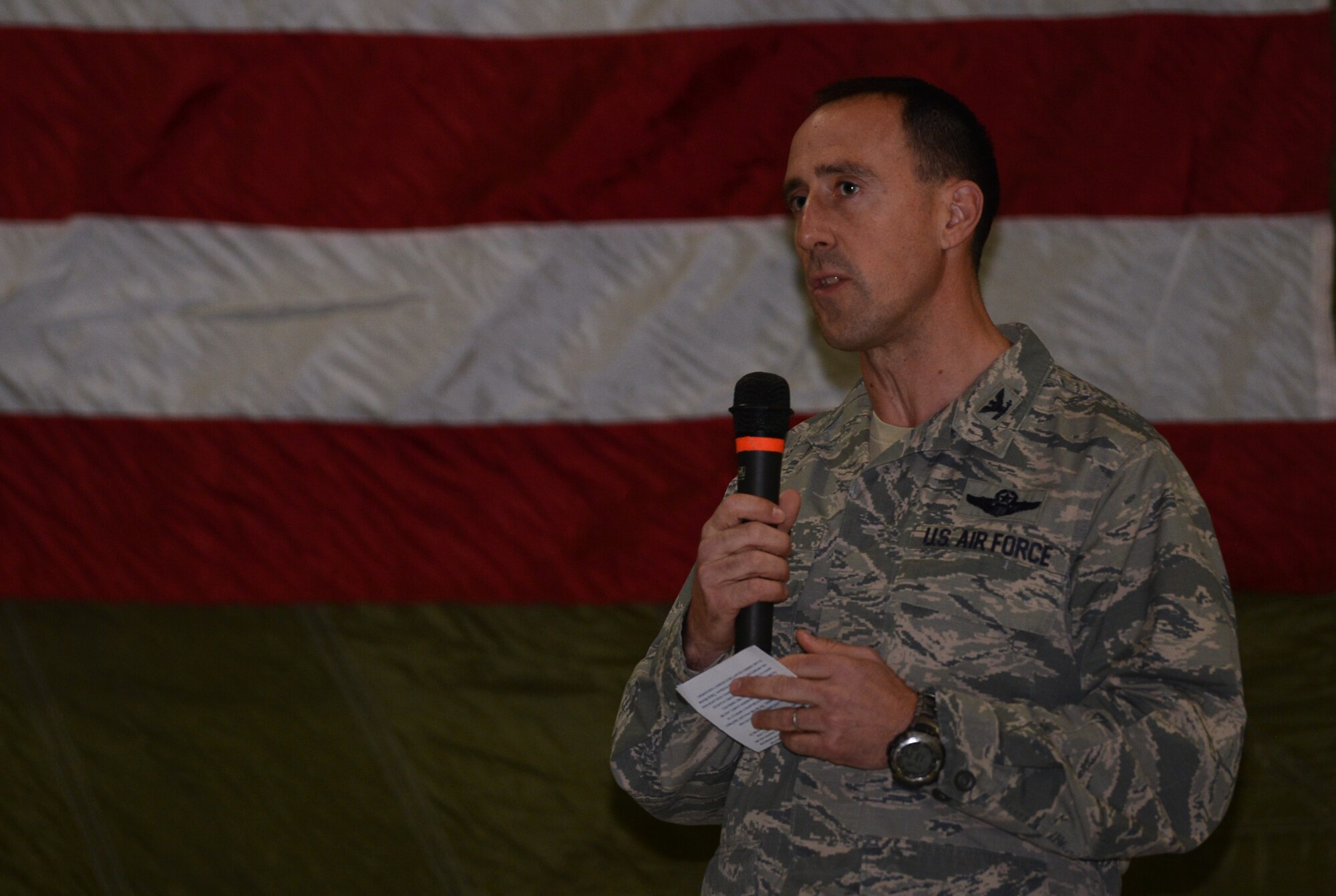 Col. Leonard Kosinski, 62nd Airlift Wing commander congratulates Airmen from the McChord Field Honor Guard at a change or responsibility ceremony Dec. 13, 2016 at Joint Base Lewis-McChord, Wash. The McChord Field Honor Guard serves at ceremonies such as performing military honors as well as presenting the colors across the Pacific Northwest for active duty, retirees and veterans. (U.S. Air Force photo/Senior Airman Jacob Jimenez) 