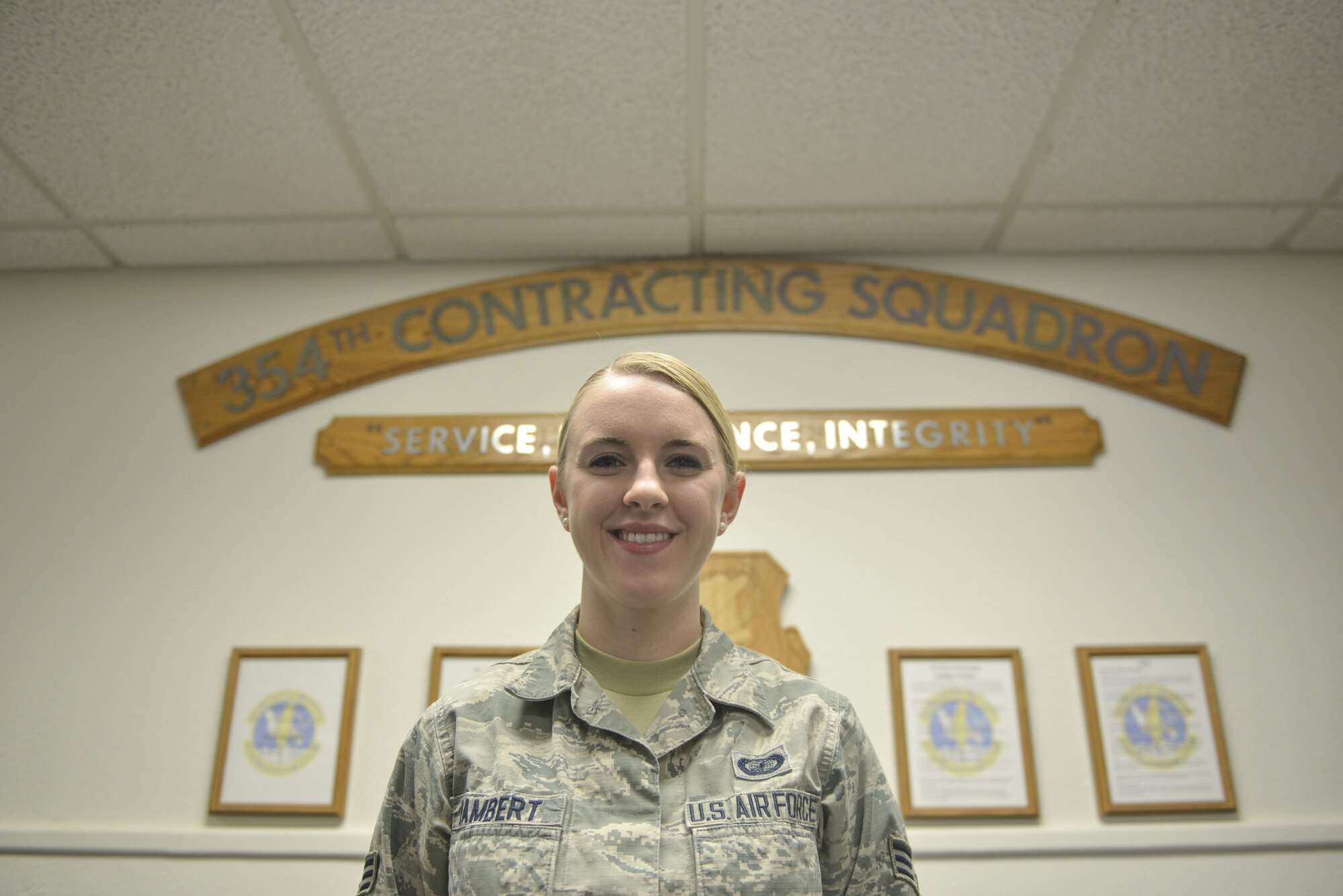 U.S. Air Force Senior Airman Sadie Lambert, a 354th Contracting Squadron contract specialist, takes a brief break for a photo Nov. 22, 2016, at Eielson Air Force Base, Alaska. Lambert said she has taken an interest in photography and enjoys trying to photograph the aurora borealis. (U.S. Air Force photo by Airman Isaac Johnson)
