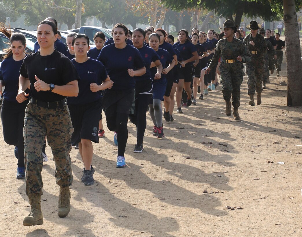 Recruiting Station Los Angeles Commanding Officer, Maj. Aixa R. Dones, leads future Marines on a motivational run while drill instructors call cadence during a female future Marine function for Recruiting Station Los Angeles at Sherman Oaks Recreation Park, Dec. 10, 2016. (U.S. Marine Corps photo by Staff Sgt. Alicia R. Leaders/Released)