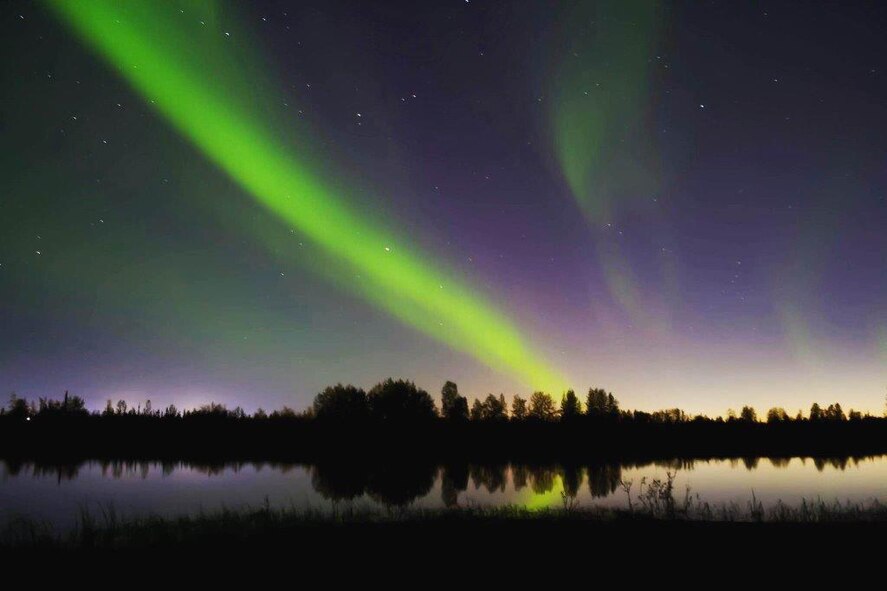 U.S. Air Force Senior Airman Sadie Lambert, a 354th Contracting Squadron contract specialist, took this photo of the aurora borealis near Mullins Pit on Eielson Air Force Base, Alaska. Lambert tinkers with photography on her down time. (Courtesy photo)