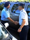 U.S. Air Force Lt. Gen. Ken Wilsbach, Commander, 11th Air Force, greets Indian Air Force Air Marshal Birender Dhanoa, Vice Chief of the Air Staff, upon arrival to Joint Base Pearl Harbor-Hickam, Dec. 13, 2016, in support of the Executive Steering Group.  Senior military leaders from the Indian Air Force and the U.S. Air Force held an executive steering group meeting to discuss operational concepts and chart the way ahead for future training exchanges and exercises between both militaries. (U.S. Air Force photo by Master Sgt. George Maddon)