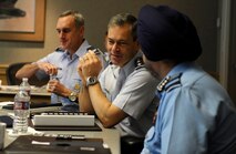 U.S. Air Force Lt. Gen. Ken Wilsbach, Commander, 11th Air Force, converses with Indian Air Force Air Marshal Birender Dhanoa, Vice Chief of the Air Staff, Dec. 13, 2016, prior to opening remarks of the Executive Steering Group.  Senior military leaders from the Indian Air Force and the U.S. Air Force held an executive steering group meeting to discuss operational concepts and chart the way ahead for future training exchanges and exercises between both militaries. (U.S. Air Force photo by Master Sgt. George Maddon)