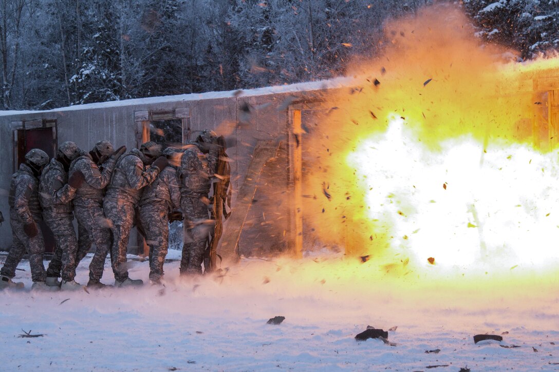 Paratroopers practice door-breaching techniques during the urban mobility breacher course at Joint Base Elmendorf-Richardson, Alaska, Dec. 13, 2016. Army photo by Spc. Donald Williams