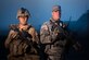 U.S. Air Force Senior Airman Shaun McQuiston and U.S. Marine Corps Lance Cpl. Michael Hall, both 407th Expeditionary Security Forces Squadron, pose for a photo at the 407th Air Expeditionary Group, Southwest Asia Dec. 17, 2016. The expeditionary security forces unit uses active duty and reserve Airmen and Marines as well as Polish forces working together to keep the base secure.  (U.S. Air Force photo/Master Sgt. Benjamin Wilson)(Released)
