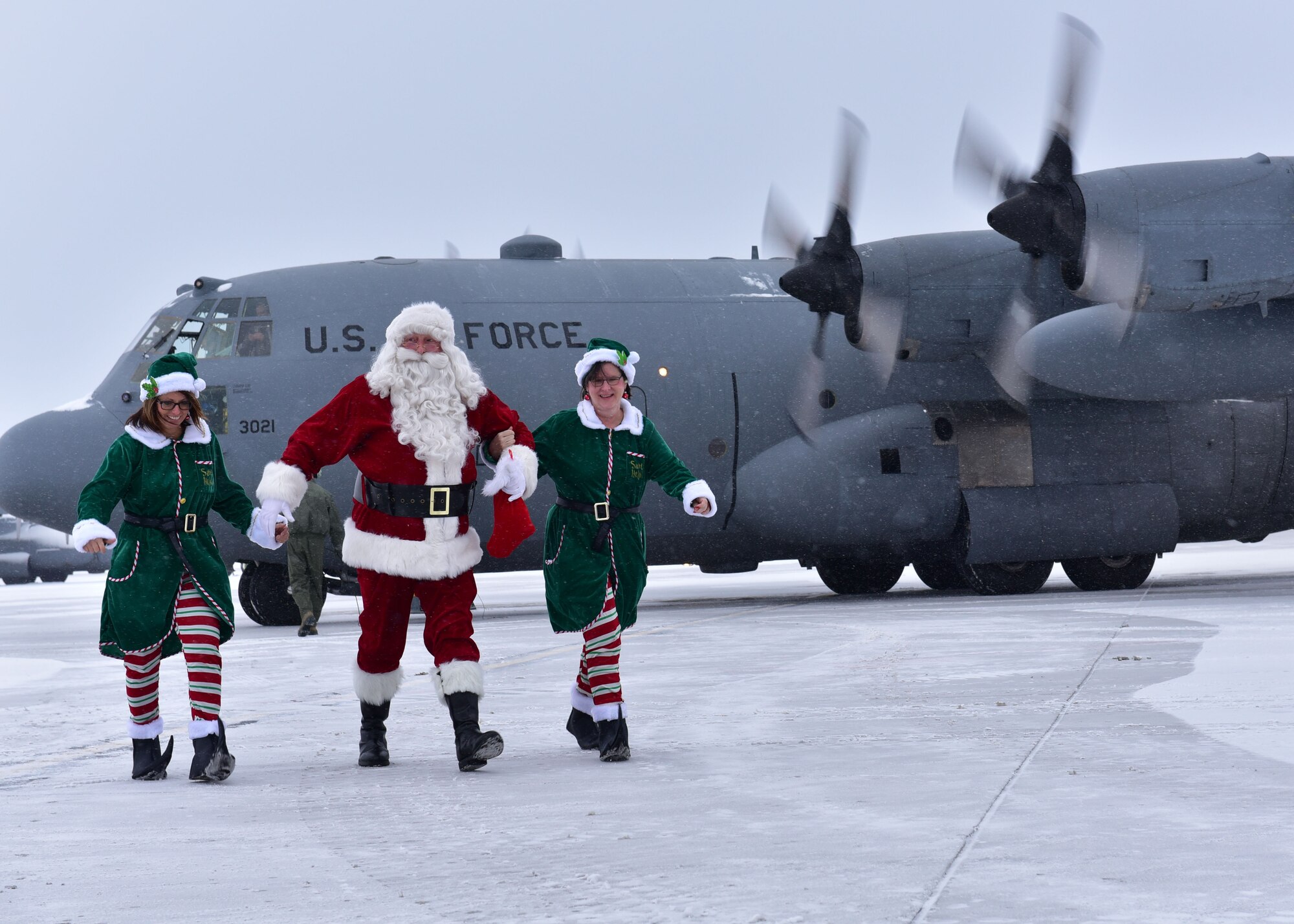 Santa Claus arrives at the Niagara Falls Air Reserve Station December 17, 2016. This is Santa's last visit here aboard a Niagara C-130 Hercules as the 914th Airlift Wing is transitioning to the KC-135 Stratotanker. (U.S. Air Force photo by Staff Sgt. Richard Mekkri)
