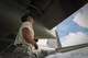 Senior Airman Joshua Acosta-Radilla, 374th Maintenance Group aircraft structural maintenance apprentice, inspects the wing of a C-130H Hercules during Operation Christmas Drop 2016 at Andersen Air Force Base, Guam, Dec. 10, 2016. Every December, C-130H Hercules maintainers from Yokota head to Andersen Air Force Base to support low-cost, low-altitude humanitarian airdrops to islanders throughout the Commonwealth of the Northern Marianas, Federated States of Micronesia and Republic of Palau. (U.S. Air Force photo by Senior Airman Elizabeth Baker)