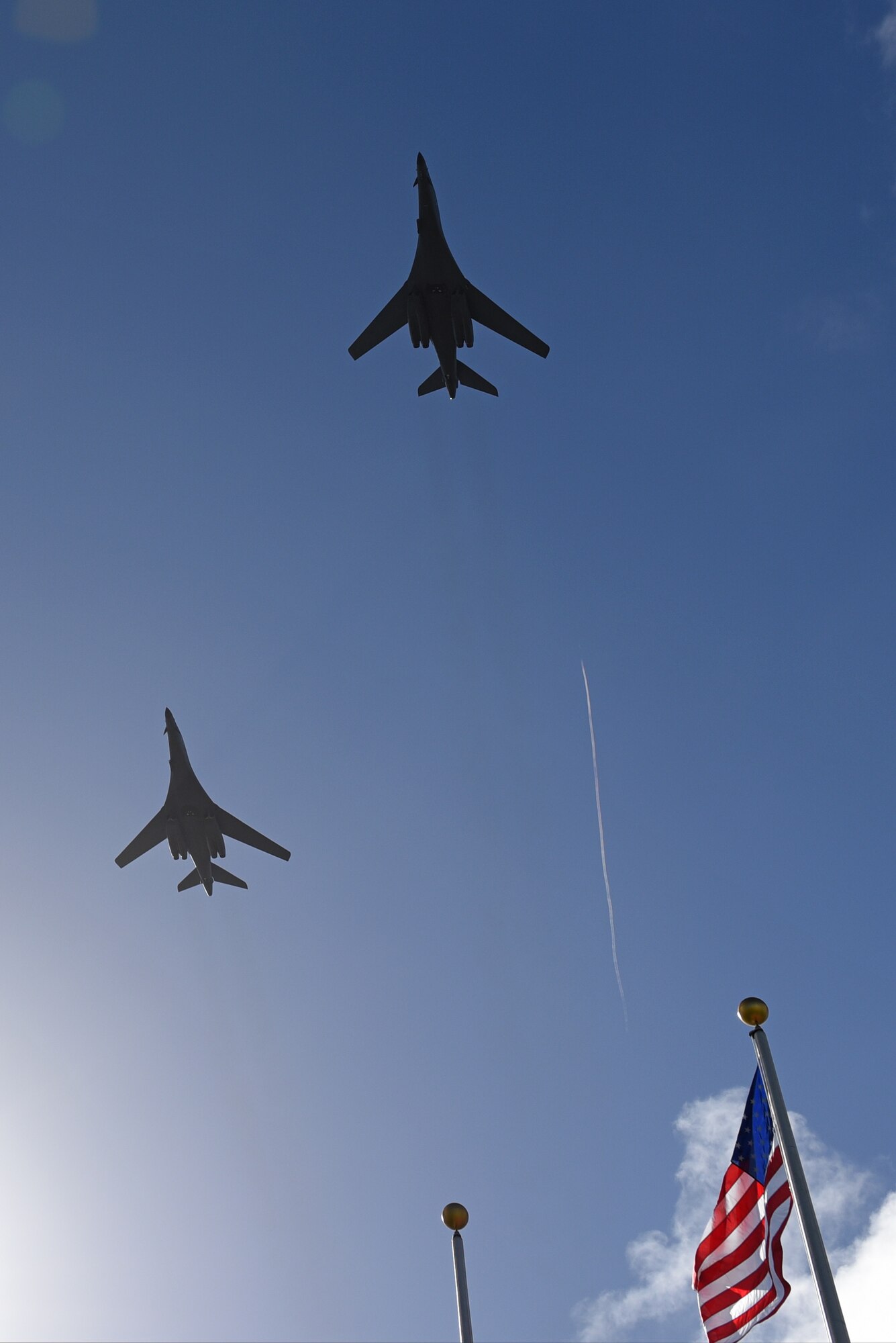 B-1B Lancers perform a flyover to begin the Operation Linebacker II Remembrance Ceremony Dec. 16, 2016, at Andersen Air Force Base, Guam.  A formation of 33 Airmen stood at the ceremony to represent the 33 who lost their lives flying in B-52 Stratofortress bombers during Operation Linebacker II. (U.S. Air Force photo/Airman 1st Class Jacob Skovo)