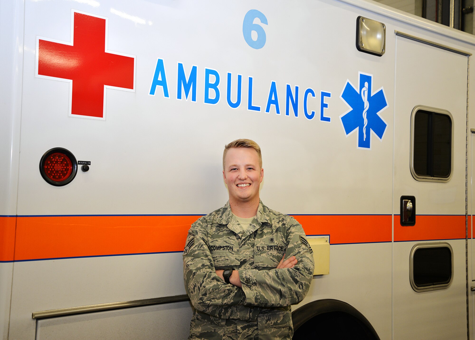 U.S. Air Force Senior Airman Josh Compston, 48th Medical Operations Squadron paramedic, poses for a photograph at the 100th Civil Engineer Squadron Fire Department Dec. 15, 2016, on RAF Mildenhall, England. Compston is embedded with the fire department to ensure the base can provide around-the-clock medical support in the event of an emergency. He earned the Square D Spotlight for exhibiting the Air Force’s core value, Excellence in All We Do. (U.S. Air Force photo by Karen Abeyasekere)
