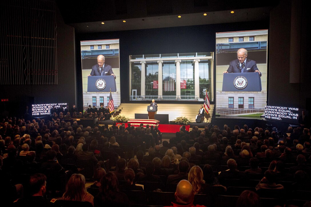 Attendees listen as Vice President Joe Biden delivers remarks during a celebration of the life of John Glenn at the Ohio State University in Columbus, Dec. 17, 2016. Marine Corps photo by Lance Cpl. Daisha R. Sosa