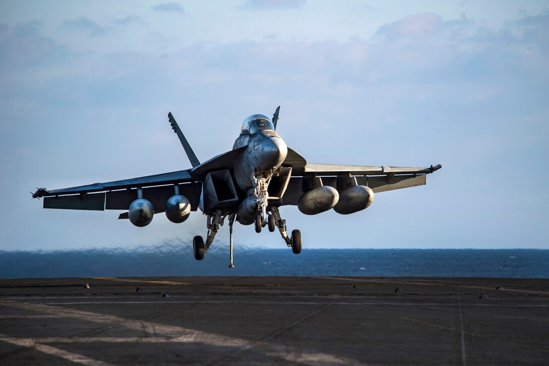 An F/A-18F Super Hornet prepares to land on the flight deck of the aircraft carrier USS Dwight D. Eisenhower in the Mediterranean Sea, Dec. 10, 2016. Navy photo by Petty Officer 3rd Class Nathan T. Beard
