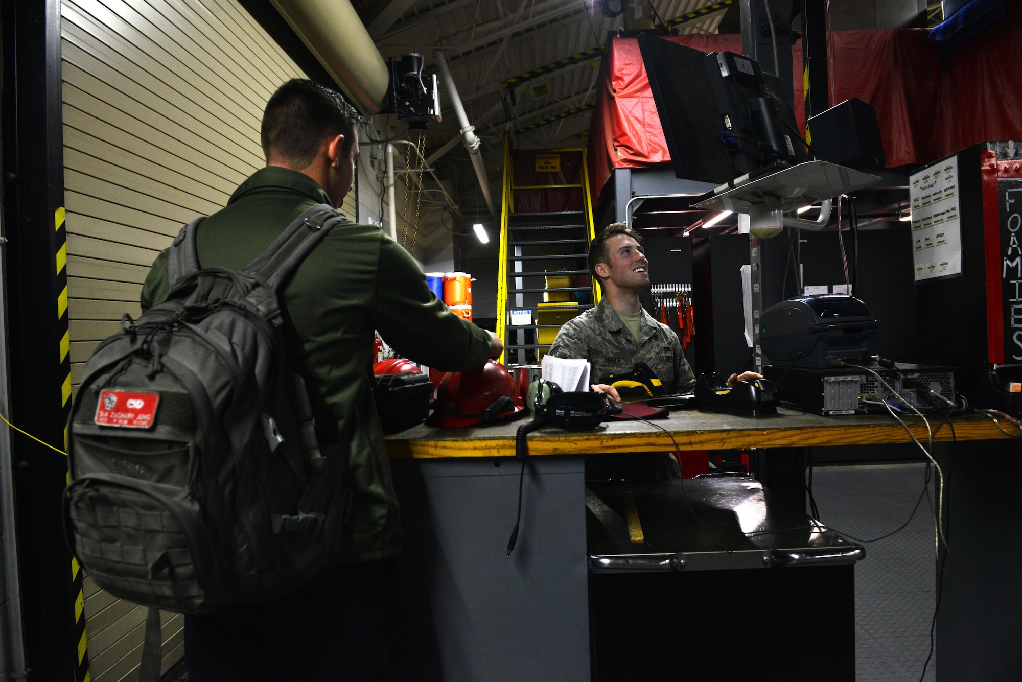 U.S. Air Force Senior Airman Zachary Jung, 20th Aircraft Maintenance Squadron tactical aircraft maintainer, checks out tools from Senior Airman Alexander Dibble, 20th AMXS support technician, at Shaw Air Force Base, S.C., Dec. 14, 2016. Tools are issued and returned at the beginning and end of every shift, inspected each time by both the tactical aircraft maintainers and support technicians. (U.S. Air Force photo by Airman 1st Class Destinee Sweeney)