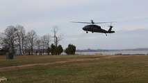 An UH-60 Blackhawk helicopter assigned to 12th Aviation Battalion, U.S. Army, approaches a landing field prior to a sling load operation as part of Chemical Biological Incident Response Force, CBIRF, Initial Reaction Force B certification exercise, CERTEX, aboard Naval Support Facility Indian Head Annex Stump Neck, Md., Dec. 13, 2016. This CERTEX evaluated all sections composing the IRF including identification and detection, technical rescue, decontamination, search and rescue/casualty extraction, medical, explosive ordnance disposal, as well as command and control.  (Official U.S. Marine Corps photo by Staff Sgt. Santiago G. Colon Jr./RELEASED)
