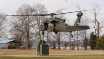 Embarkation specialist Marines with Chemical Biological Incident Response Force, CBIRF, prepare to attach a container of supplies to an UH-60 Blackhawk helicopter assigned to 12th Aviation Battalion, U.S. Army, during a sling load operation as part of Initial Reaction Force B certification exercise, CERTEX, aboard Naval Support Facility Indian Head Annex Stump Neck, Md., Dec. 13, 2016. This CERTEX evaluated all sections composing the IRF including identification and detection, technical rescue, decontamination, search and rescue/casualty extraction, medical, explosive ordnance disposal, as well as command and control.  (Official U.S. Marine Corps photo by Staff Sgt. Santiago G. Colon Jr./RELEASED)