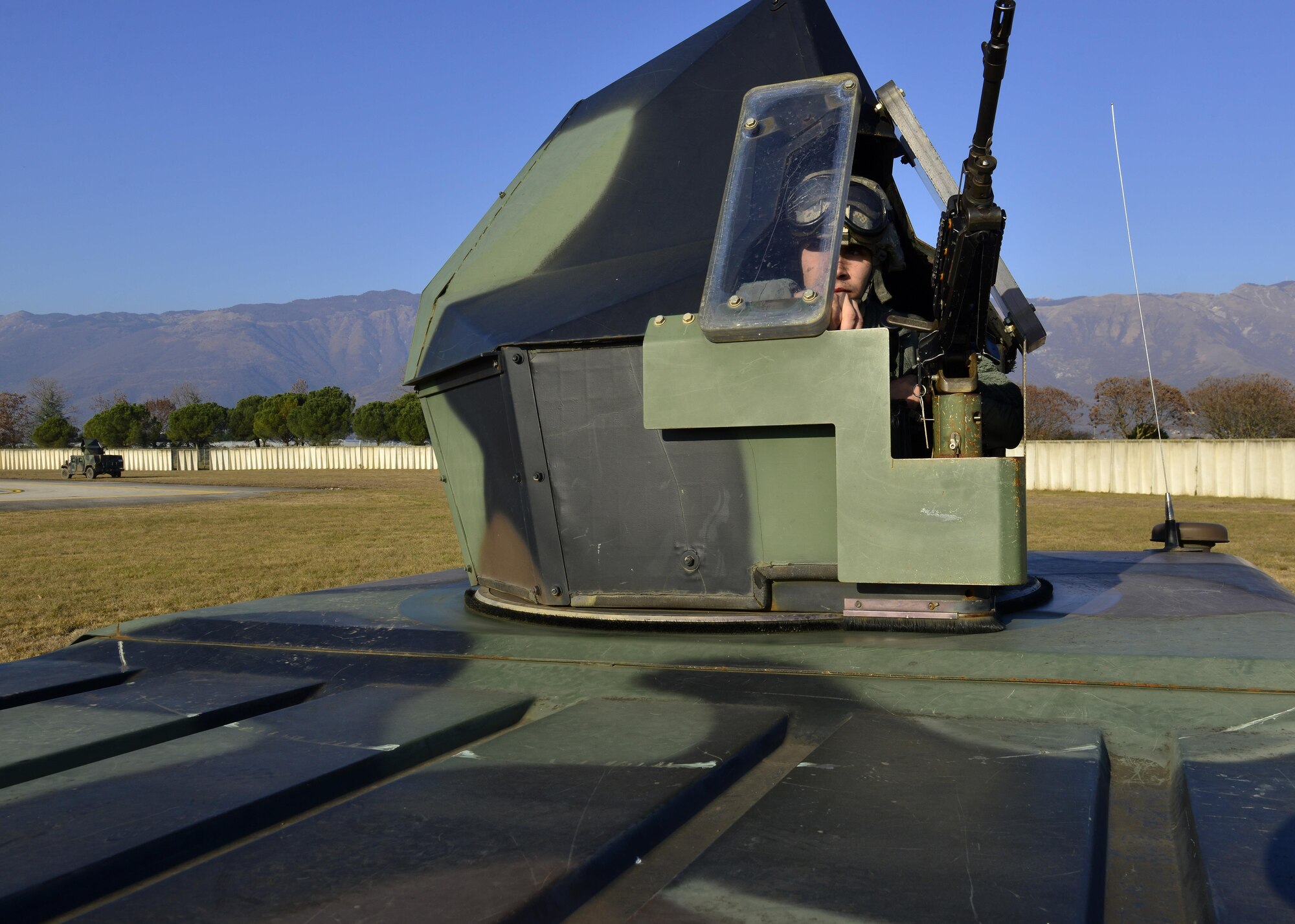 Airmen 1st Class Nicholas Bogroff, 31st Security Forces defender, provides simulated security during an exercise at Aviano Air Base, Italy on Dec. 15, 2016. Airmen perform exercises throughout the year with the help of the wing safety and inspector general offices to ensure Airmen properly and safely conduct every exercise. (U.S. Air Force photo by Senior Airman Cary Smith)