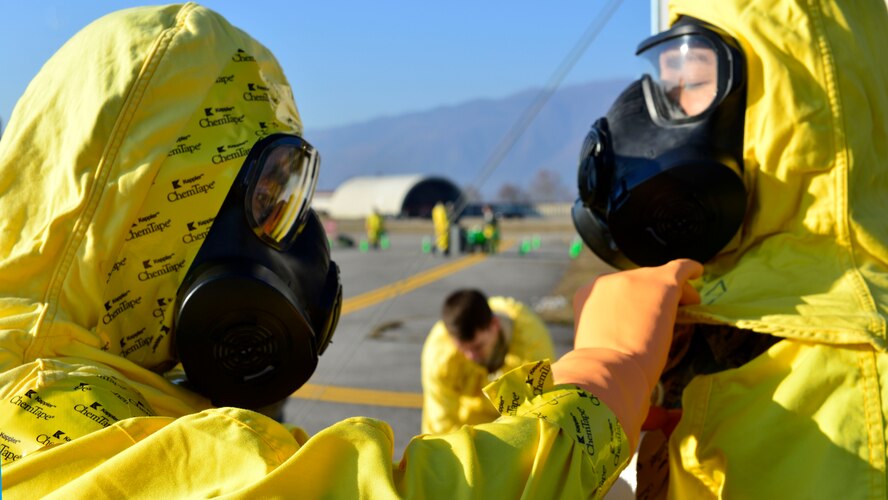 An Airmen seals a containment suit during an exercise at Aviano Air Base, Italy on Dec. 15, 2016. The exercise was designed to test Team Aviano’s capabilities. (U.S. Air Force photo by Senior Airman Cary Smith)