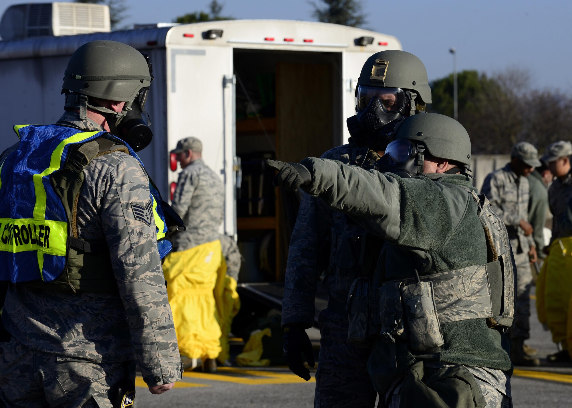 Airmen from the 31st Security Forces Squadron coordinate simulated security during an exercise at Aviano Air Base, Italy on Dec. 15, 2016. Airmen perform exercises throughout the year with the help of the wing safety and inspector general offices to ensure Airmen properly and safely conduct every exercise. (U.S. Air Force photo by Senior Airman Cary Smith)