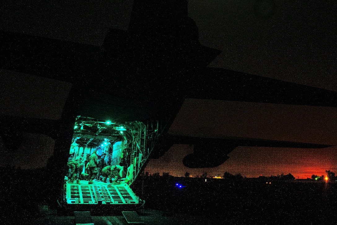 Airmen prepare a C-130H Hercules aircraft for cargo in Iraq, Dec. 15, 2016. Air Force photo by Senior Airman Jordan Castelan