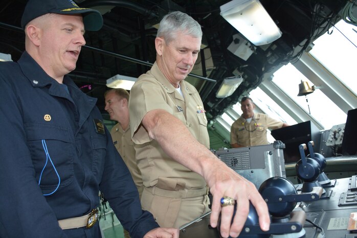 160808-N-OA548-381 SAN DIEGO (Aug. 8, 2016) Vice Adm. Thomas Moore, Naval Sea Systems Command commander, explores equipment on the bridge of USS Freedom (LCS 2), Aug. 8. Moore reviewed maintenance progress while touring the ship during his visit to San Diego. 