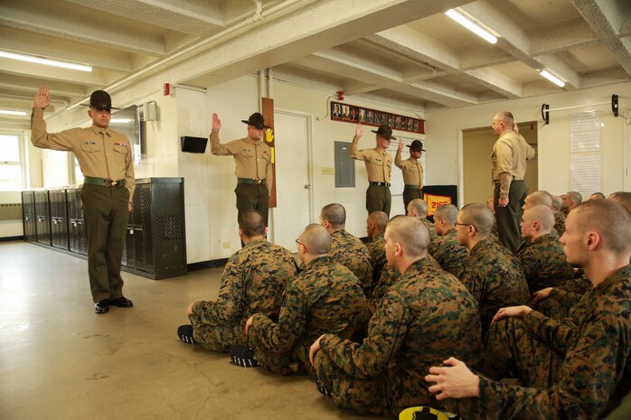 Drill instructors from Hotel Company, 2nd Recruit Training Battalion, recite the Drill Instructor Creed during pick up at Marine Corps Recruit Depot San Diego, Dec. 17. The creed is the oath the Drill instructors recite during pick up and is a pledge to the recruits that they will be trained to the best of their ability. Annually, more than 17,000 males recruited from the Western Recruiting Region are trained at MCRD San Diego. . Hotel Company is scheduled to graduate March 10.