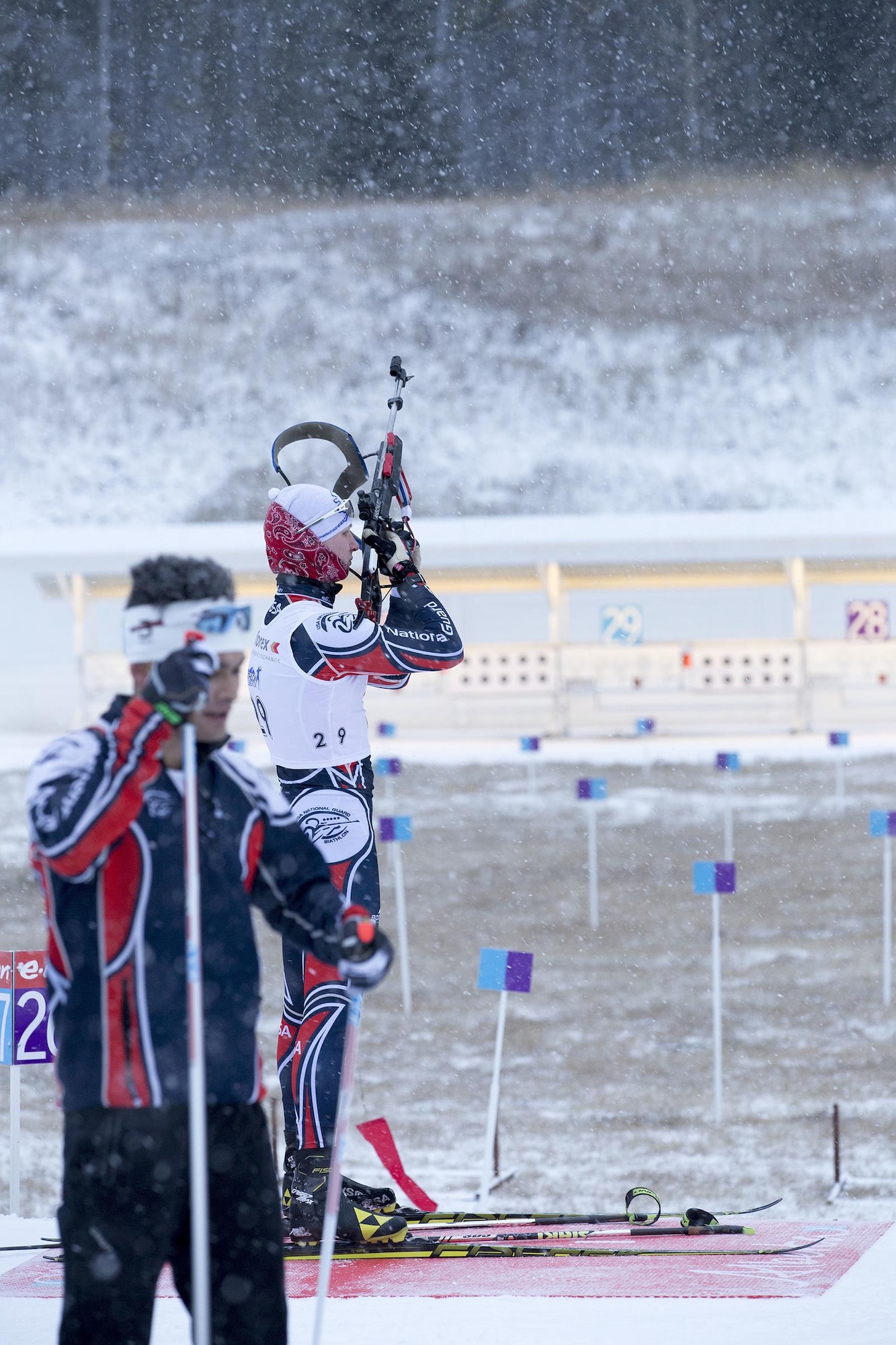 Alaska Army Guardsman Pfc. Travis Cooper, a construction equipment mechanic with the 207th Engineer Utility Detachment, zeros in his rifle before competing and winning the junior men’s 12.5 km mass start in the North American #1 and Calforex #1 Biathlon Cups at the Canmore Nordic Centre Provincial Park in Canmore, Alberta, Dec. 4, 2016. Cooper, 20, of Kenai, also took first place in the junior men’s 10 km sprint the day before. Cooper trains year-round and competes on the National Guard Biathlon development team. (U.S. Army National Guard photo by Staff Sgt. Balinda O’Neal Dresel)
