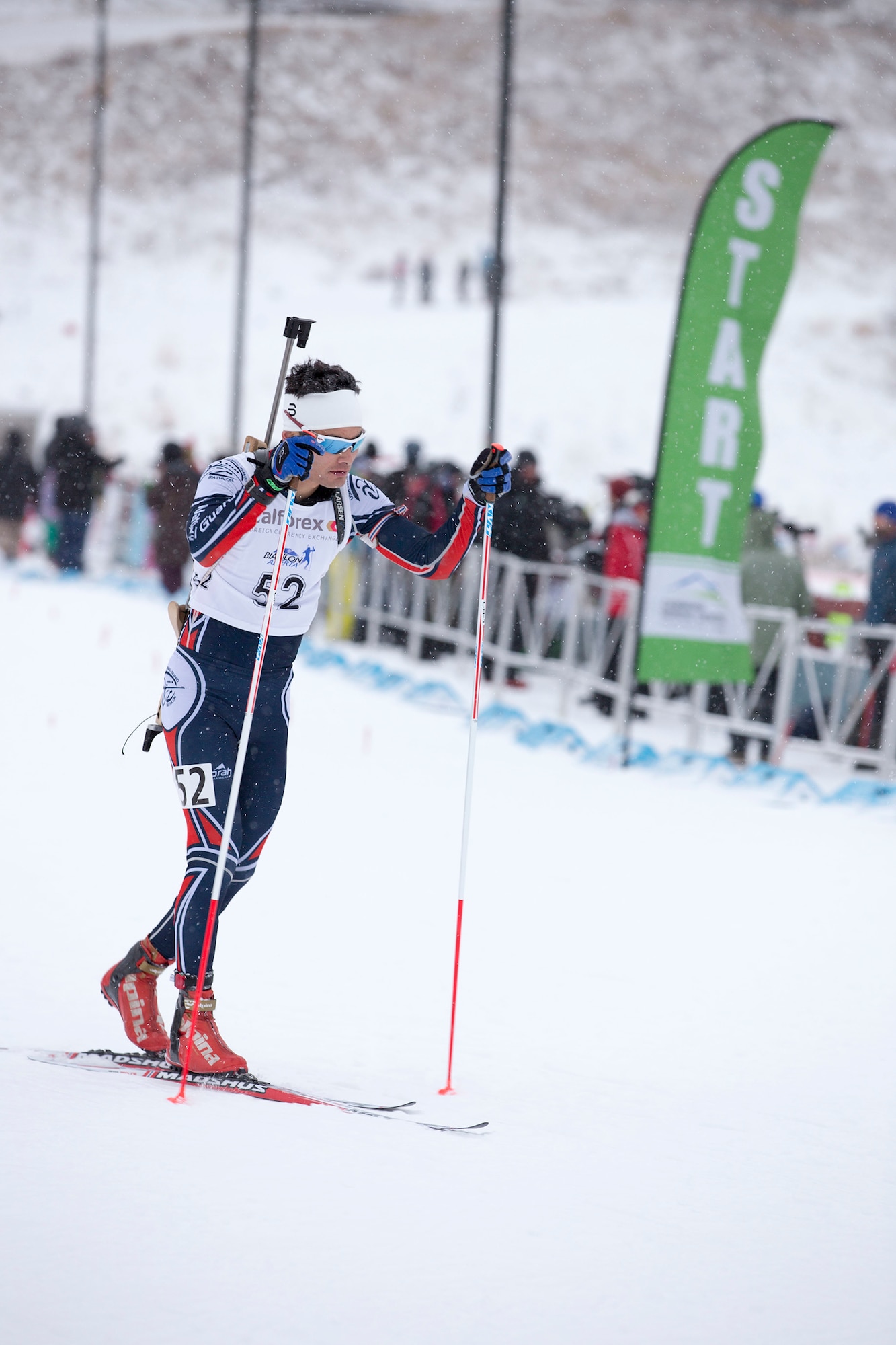 Alaska Guardsman Spc. Tahdg Nakada, a signal support specialist with Headquarters and Headquarters Company, 1st Battalion, 207th Aviation Regiment, competes in the North American #1 and Calforex #1 Biathlon Cups at the Canmore Nordic Centre Provincial Park in Canmore, Alberta, Dec. 4, 2016. Nakada, 22, of Anchorage, placed 15th overall in both the men’s 10 km sprint and 15 km mass start during the two-day competition. (U.S. Army National Guard photo by Staff Sgt. Balinda O’Neal Dresel)