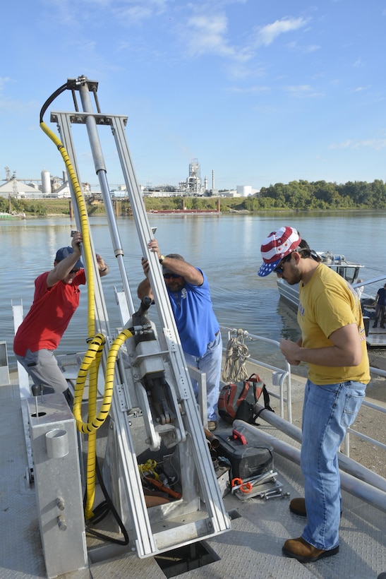 Researchers from ERDC’s Coastal and Hydraulics Laboratory set up the drilling rig on the new coring barge. The shallow-draft vessel can reach areas inaccessible to land-based and larger drill rigs, and provides a new capability for U.S. Army Corps of Engineers researchers.   