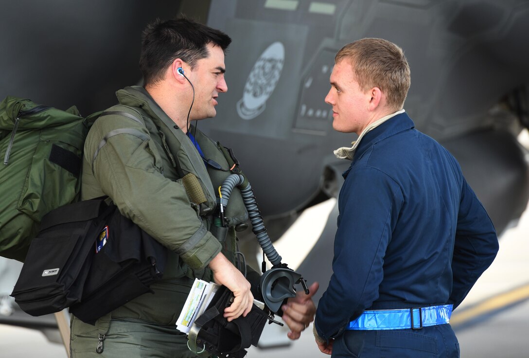 U.S. Air Force Senior Airman Gideon Burris, 33d Aircraft Maintenance Squadron F-35A crew chief, speaks with Capt. Brian Burgoon, 58th Fighter Squadron weapons officer, after landing during Checkered Flag 17-01, Dec. 8, 2016, at Tyndall Air Force Base, Florida. Checkered Flag facilitates integration between fifth and fourth-generation aircraft communities. These exercises are critical to hone the tactics techniques and procedures (TTP’s) for the aircraft’s inevitable deployment fighting alongside other combat assets. While the exercise is prime opportunity to learn about how we fly the aircraft, it presents the same learning opportunities for preventative and restorative maintenance. (U.S. Air Force photo by Staff Sgt. Peter Thompson)