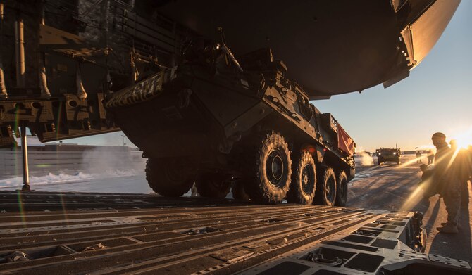 A Stryker armored vehicle from the 1st Stryker Brigade Combat Team, 25th Infantry Division is loaded onto a C-17 Globemaster III Dec. 13, 2016, at Eielson Air Force Base, Alaska. A contingency response team was sent to Eielson AFB to support the Army’s Rapid Alaska Airlift Week exercise. (U.S. Air Force photo/Staff Sgt. Robert Hicks)