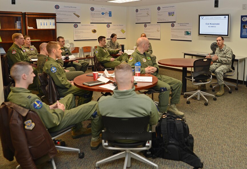Col. Leonard Kosinski (right), 62nd Airlift Wing commander, talks to Team McChord flight commanders during a flight commanders course Dec. 16, 2016, at Joint Base Lewis-McChord, Wash. The quarterly course provides briefings from a variety of base agencies and has open discussions from squadron commanders and McChord leadership. (U.S. Air Force photo/Senior Airman Jacob Jimenez)   