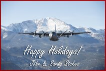 Maj. Gen. John Stokes, 22nd Air Force commander, would like to wish all 22nd AF Airmen a happy holiday season. Pictured is a C-130 from the 302nd Airlift Wing in front of Pikes Peak, Colorado Springs, Colo. during a local training mission, Dec. 19, 2014. (U.S. Air Force image/Senior Airman Spencer Kennedy and Staff Sgt. Alan Abernethy)
